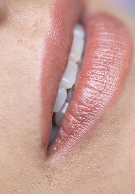 Asian model Marina Matsumoto removes a kimono to get naked in a bedroom