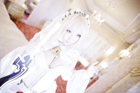 Blond japanese girl Rose D puts on a white wedding dress and gloves