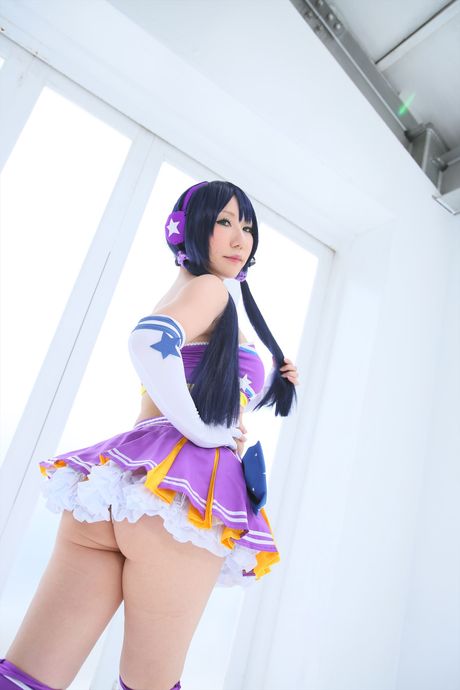 Asian cheerleader Saku strips to her knee socks and presents her natural tits