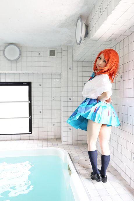 Redhead schoolgirl Higurashi Rin strips to her stockings and poses