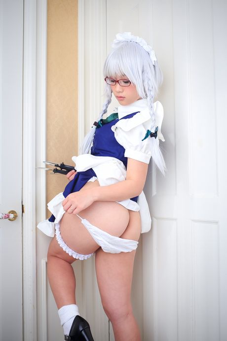 Asian maid Eri Kitami strips to her socks and exhibits her natural tits