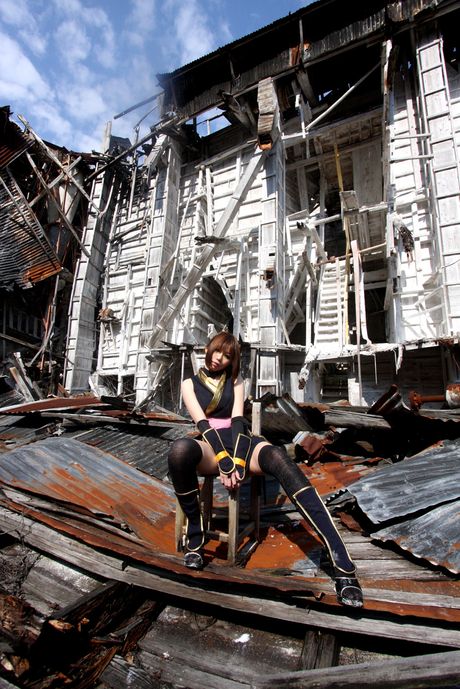 Asian stunner Higurashi Rin models a black dress and stockings in a solo