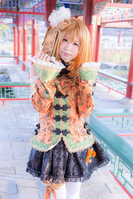 Blonde japanese babe Itsuki Akira models a black dress and stockings