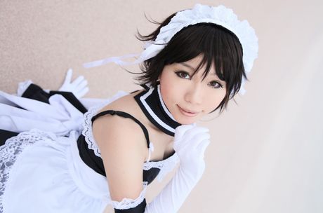 Asian maid Higurashi Rin shows her big booty and poses in stockings