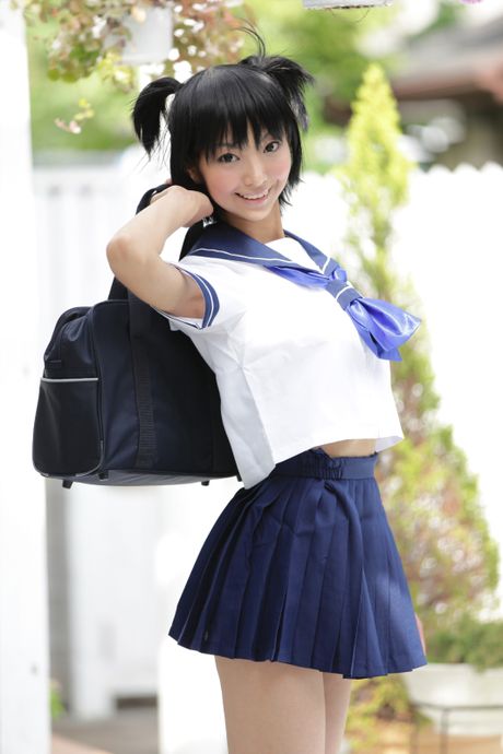 Asian schoolgirl Minatsuki Takami strips to her knee socks in the classroom