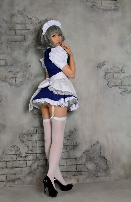 Asian maid Higurashi Rin exhibits her hot booty and poses in white stockings