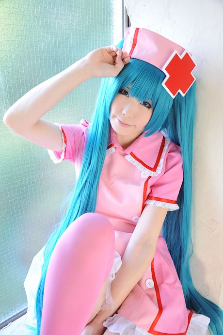Fantastic Asian nurse Haruka strips her uniform and poses in pink stockings