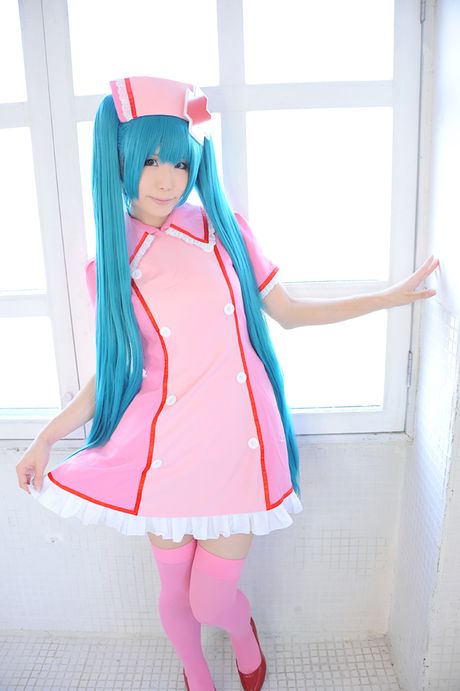 Fantastic Asian nurse Haruka strips her uniform and poses in pink stockings