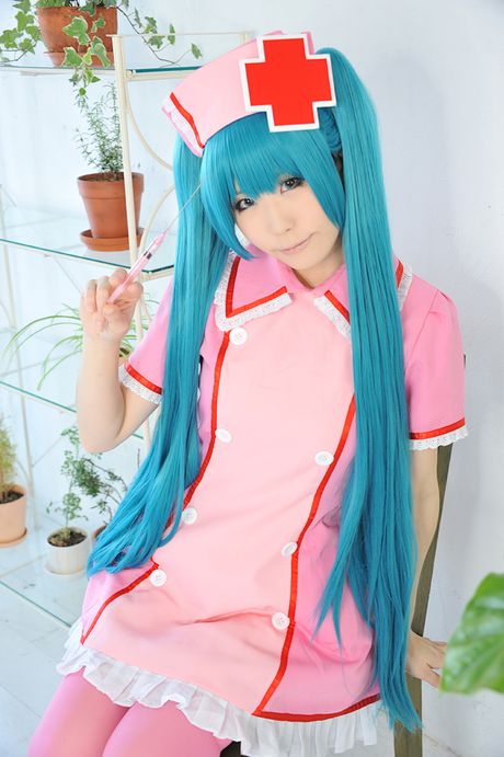 Fantastic Asian nurse Haruka strips her uniform and poses in pink stockings