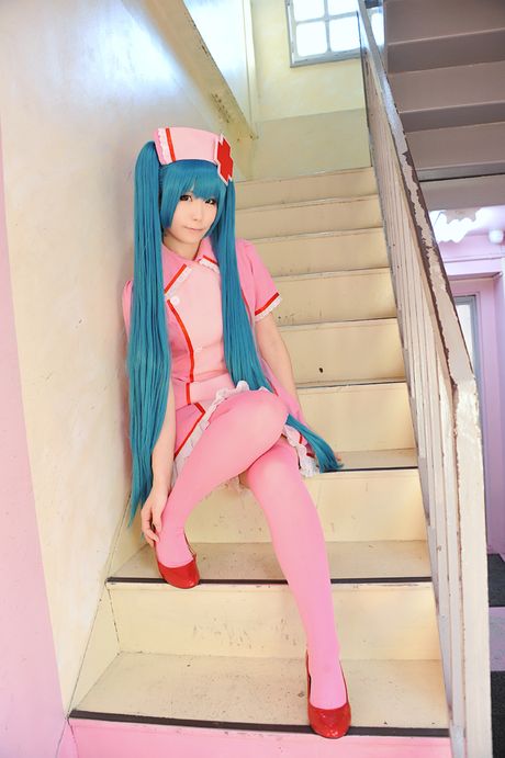 Fantastic Asian nurse Haruka strips her uniform and poses in pink stockings