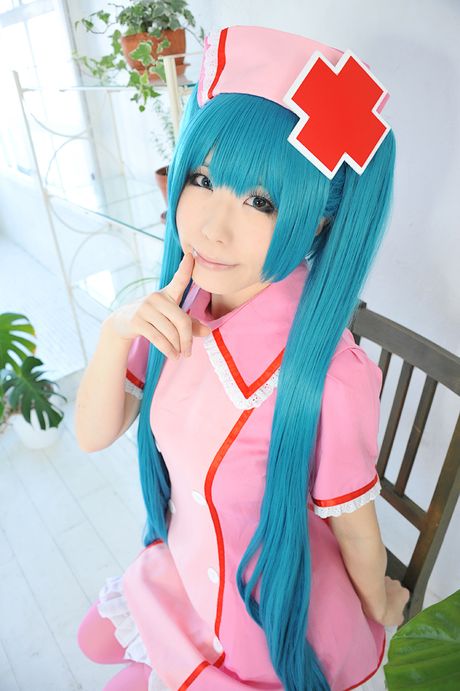 Fantastic Asian nurse Haruka strips her uniform and poses in pink stockings