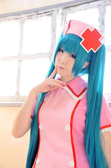 Fantastic Asian nurse Haruka strips her uniform and poses in pink stockings