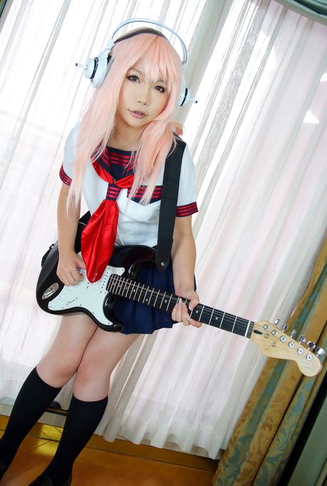 Asian stunner Higurashi Rin demonstrates her pink pussy in a school uniform