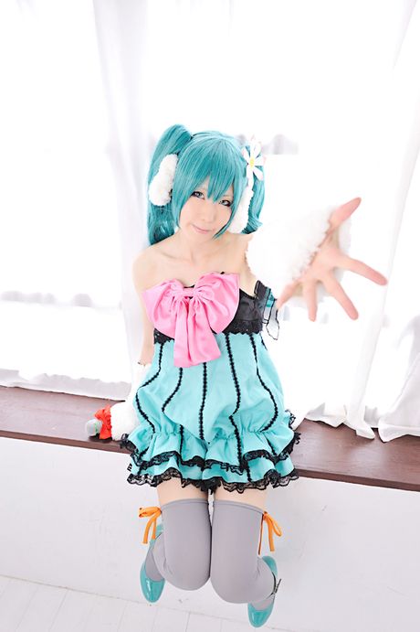 Striking japanese beauty Haruka presents her tiny tits and poses in white stockings