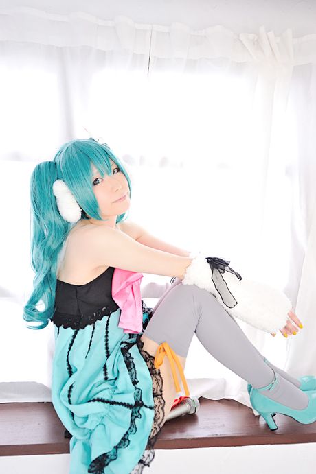 Striking japanese beauty Haruka presents her tiny tits and poses in white stockings