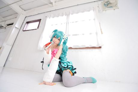 Striking japanese beauty Haruka presents her tiny tits and poses in white stockings