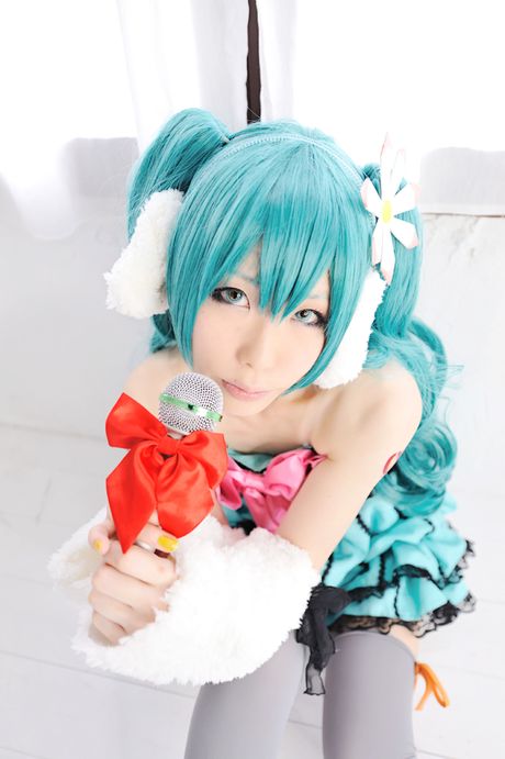 Striking japanese beauty Haruka presents her tiny tits and poses in white stockings