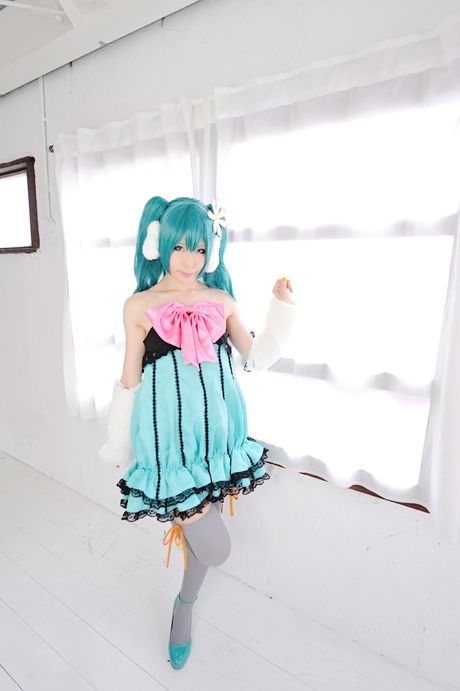 Striking japanese beauty Haruka presents her tiny tits and poses in white stockings