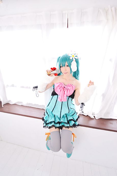 Striking japanese beauty Haruka presents her tiny tits and poses in white stockings