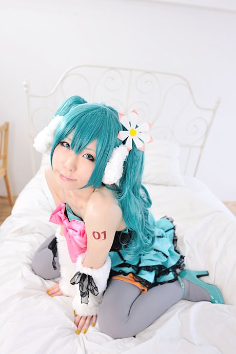 Striking japanese beauty Haruka presents her tiny tits and poses in white stockings