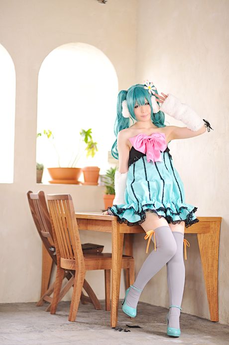 Striking japanese beauty Haruka presents her tiny tits and poses in white stockings