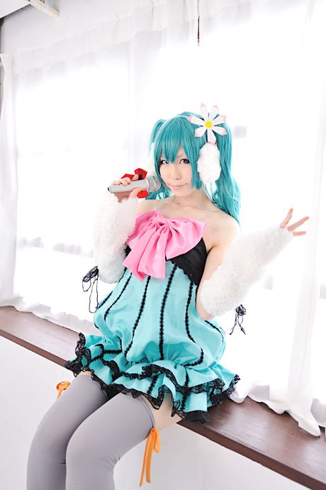 Striking japanese beauty Haruka presents her tiny tits and poses in white stockings