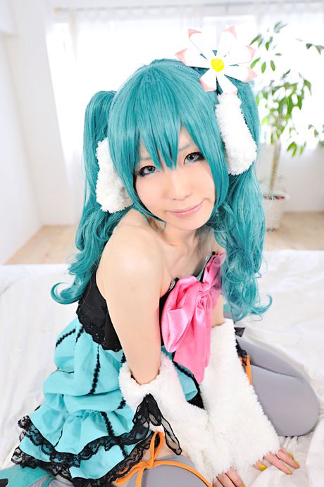 Striking japanese beauty Haruka presents her tiny tits and poses in white stockings