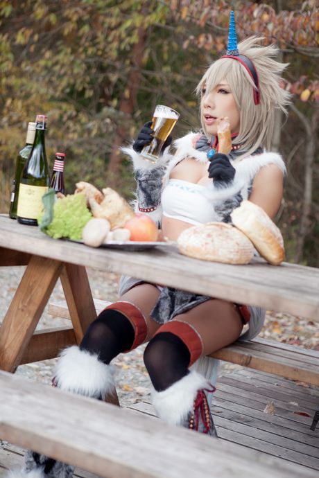 Asian covergirl Nonsummerjack sports a horned headpiece while posing in a corset