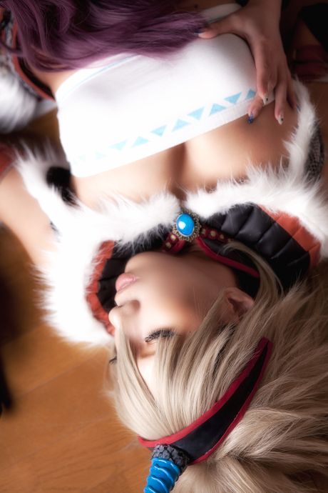 Asian covergirl Nonsummerjack sports a horned headpiece while posing in a corset