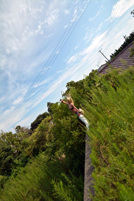 Asian teen Nonsummerjack sports a bunny tail while modelling in white panties