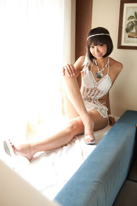 Asian teen Necoco shows her petite tits and hot ass in a solo