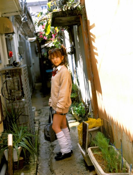 Asian beauty Reina Tanaka displays her tiny boobs and poses in a solo