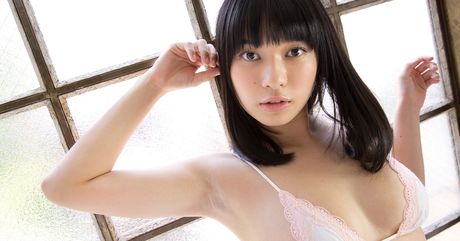 Asian girl Tomoe Yamanaka flaunts her nice tits and poses in a solo