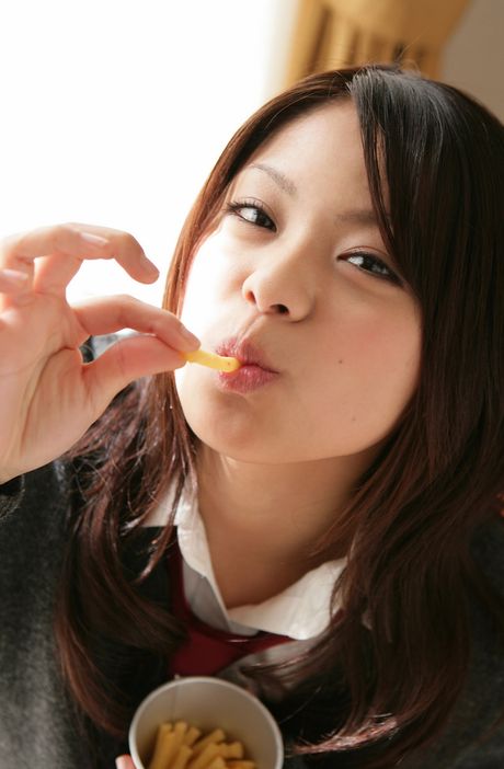 She shows her small tits and poses in her white panties