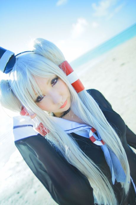 Perfect Asian teen Saku poses in her red stockings and a hat