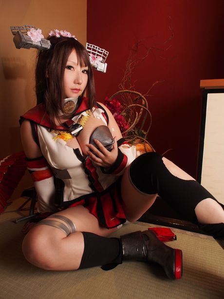 Asian doll Saku exposes her small boobs and bald pussy in a solo