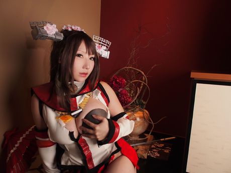 Asian doll Saku exposes her small boobs and bald pussy in a solo