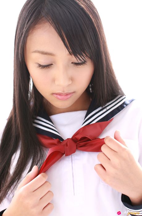 Asian schoolgirl Miyu Watanabe displays her small boobs and poses in stockings