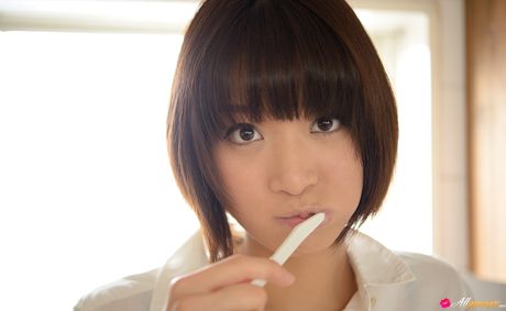 Asian stunner Mayu Kamiya unveils her petite small tits and poses in a solo