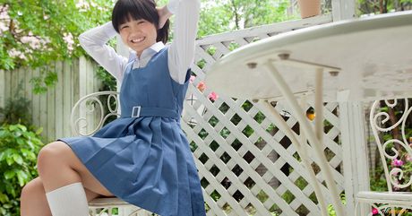 Asian babe Ai Eikura presents her big butt and poses in white stockings