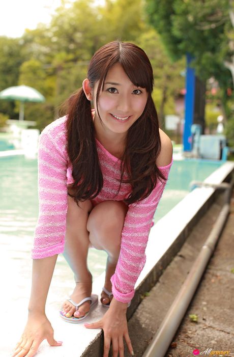 Excellent Asian babe Haruka Kohara exhibits her sexy ass and her shaved pussy