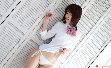 Fantastic japanese cutie Noriko Kijima strips and goes naked for the camera in her room