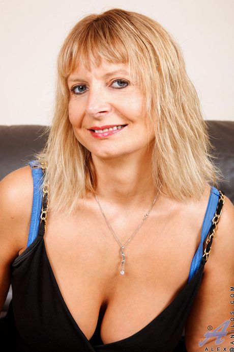 Deluxe mature Alex in nice skirt exhibits big knockers and spreads her legs 