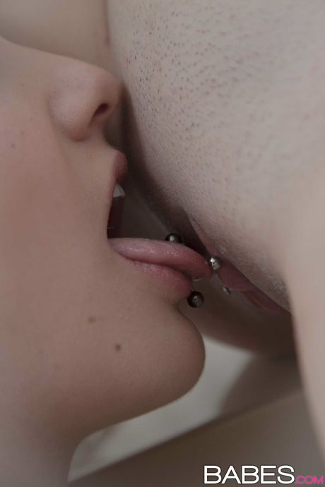 Lesbian girls Samantha Hayes and Madi Meadows have sex in a bathroom