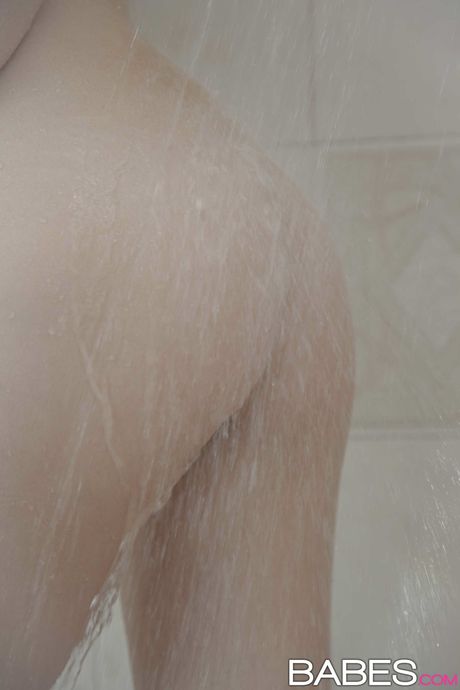 Lesbian girls Samantha Hayes and Madi Meadows have sex in a bathroom