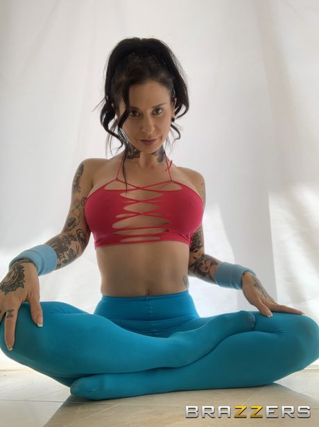 Inked american girl Joanna Angel sucks and fucks a large cock in a kitchen