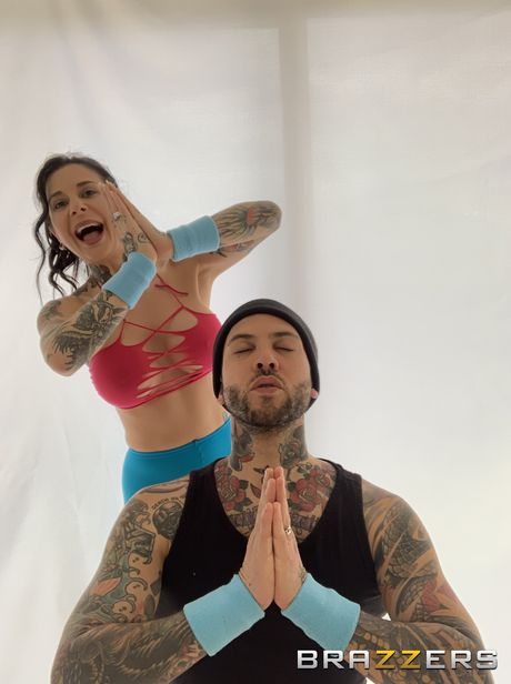 Inked american girl Joanna Angel sucks and fucks a large cock in a kitchen