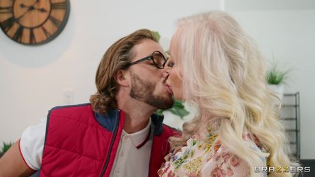 Blonde Mommy Morgan Taylor has sex with a boy on a sofa