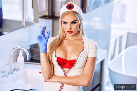 Blonde american nurse Kenzie Anne takes a cumshot on her amazing boobs after a fuck