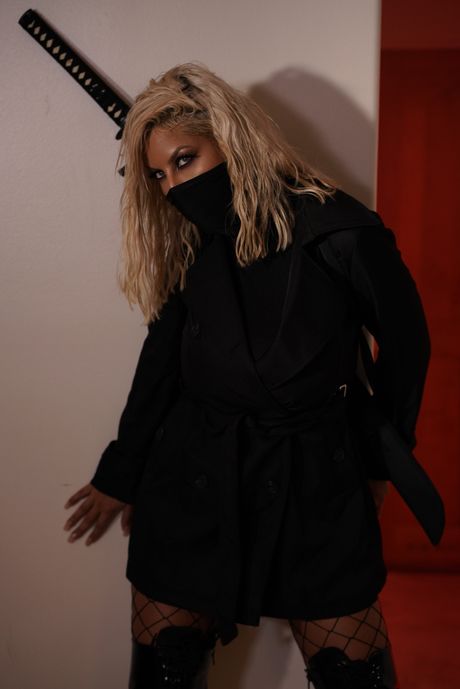 Bridgette B is a blonde assassin who loves to fuck in fishnets